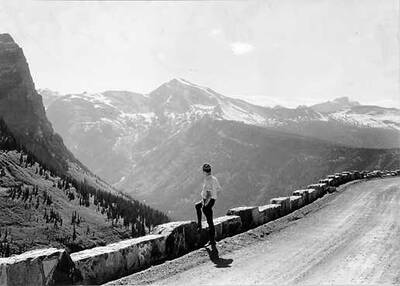 Stone parapet along new transmountain highway. Lake MacDonald side george grant