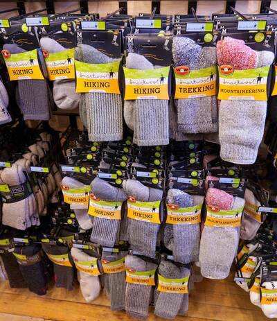 backpacking gear worth spending money on gear list beat up hiking socks in store