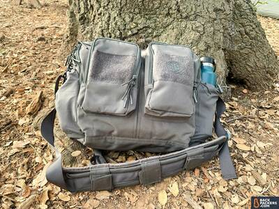 Beretta-Tactical-Messenger-Bag-laying-down-on-leaves