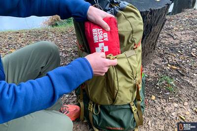 REI-Trailbreak-60-front-pouch-with-first-aid