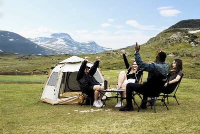 Enjoying the great outdoors at a comfy camp!