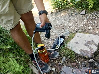 Katadyn-Hiker-Pro-review-on-trail-with-water-bottle