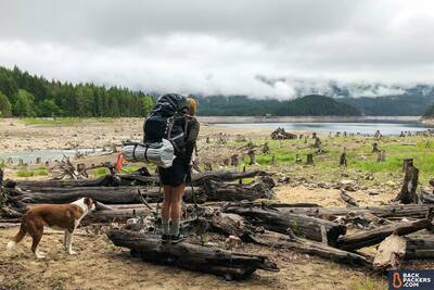 backpacking flat land view with dog and fellow backpacker