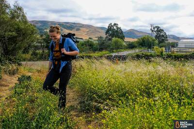 WANDRD-PRVKE-21-review-hiking-in-field