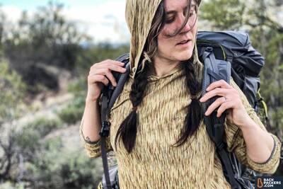 REI-Flash-55-carrying-the-backpack-s-curve-shoulder-straps