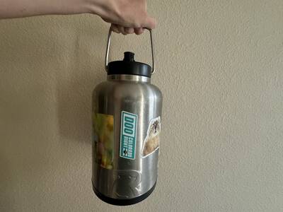 RTIC Insulated Jug with lots of stickers