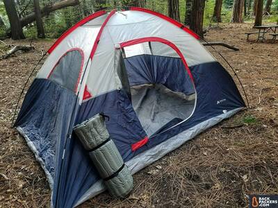 rei-camp-bed-3.5-review-rolled-up-next-to-tent